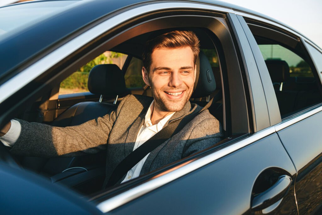 Driver seated in a car